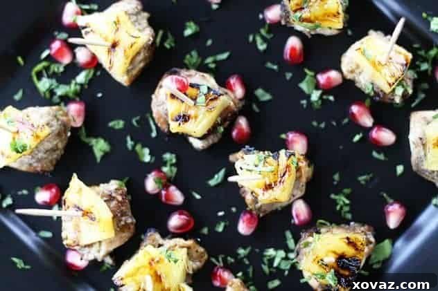 Jerk Chicken Bites with Rum Glazed Pineapple appetizer at a party