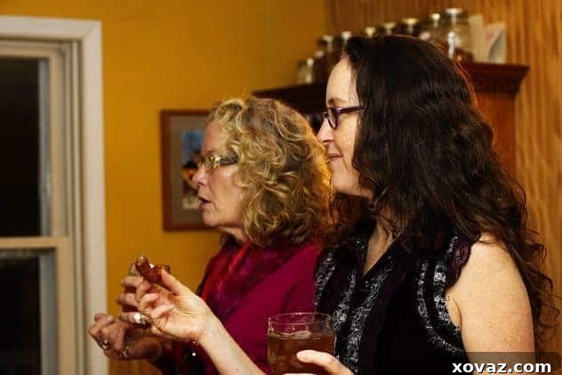 Party guests Sharon and Staci enjoying themselves and churros at a Captain Morgan themed event