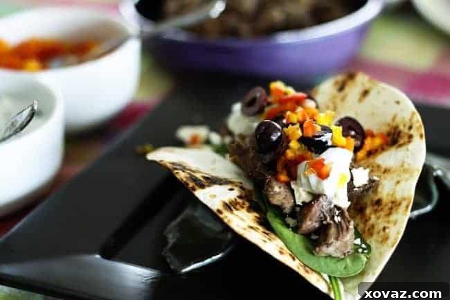 Flavorful Slow-Cooker Garlic Lamb and Greek Tacos from Foodie with Family