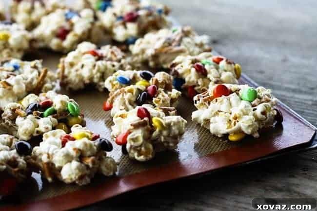 Croods' Sweet and Salty No-Bake Popcorn Bites 2 Salty and Sweet No Bake Popcorn Cookies, a delightful movie-night treat.