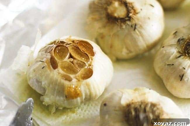 Close-up of creamy roasted garlic whipped feta in a bowl, ready to be served.