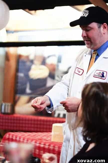 King Arthur Flour: Baking & Beyond 9 Craig Gile, Cabot Cheddar Master, demonstrating cheese grading techniques