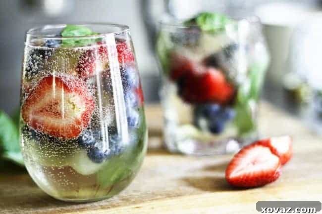 Mixed Berry Sangria by the glass with a Mocktail variation! www.foodiewithfamily.com