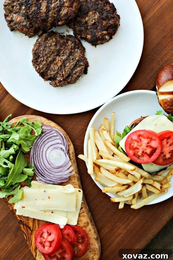 Decadent Triple Threat Burger 2 Filthy Burgers: Beef burgers filthied up with loads of pulled pork and crispy bacon in them!