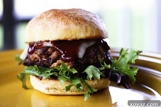 Decadent Triple Threat Burger 3 Filthy Burgers: Beef burgers filthied up with loads of pulled pork and crispy bacon in them!