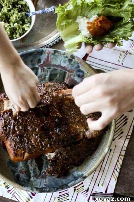 Bo Ssam -Korean Roast Pork Lettuce Wraps- served with rice, kimchi, and ginger scallion sauce