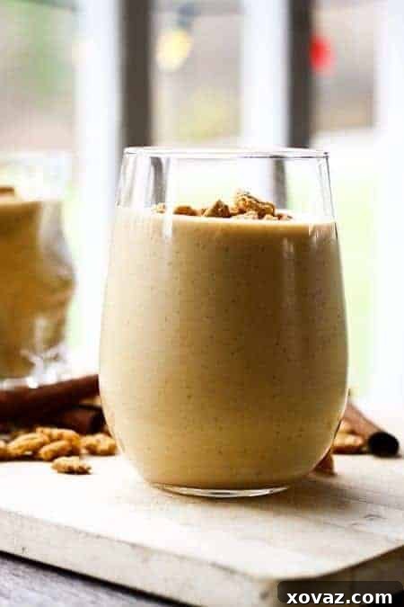 Ultimate Pumpkin Cheesecake Shake 3 Close-up of a Pumpkin Cheesecake Milkshake in a glass