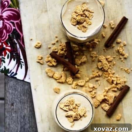 Ultimate Pumpkin Cheesecake Shake 4 Creamy Pumpkin Cheesecake Milkshake garnished with graham crackers and cinnamon
