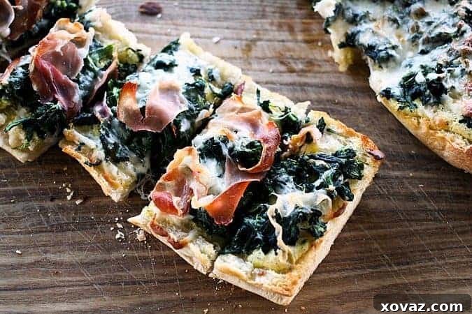 Close-up of White Spinach French Bread Pizza with Prosciutto #ComfortFood #Whitepizza