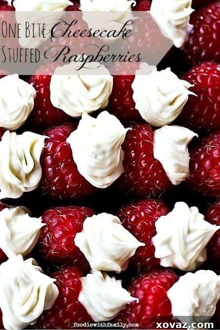 Assorted One Bite Cheesecake Stuffed Raspberries on a white plate, showcasing the vibrant colors and delicate presentation of this easy raspberry dessert.