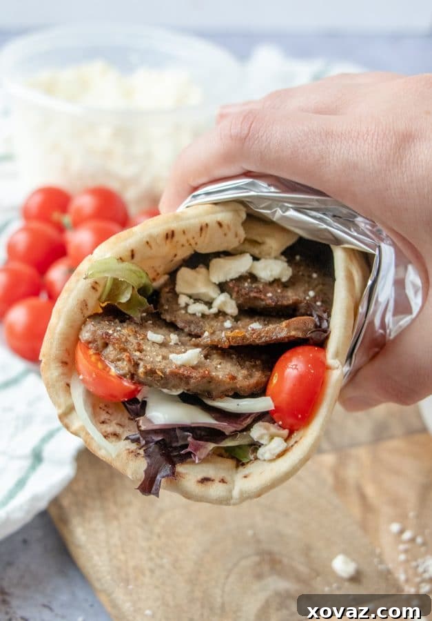 Mastering Homemade Gyro Meat and Sandwiches 6 Freshly made homemade gyro meat loaf, tightly wrapped and chilled, ready for slicing to make gyros.