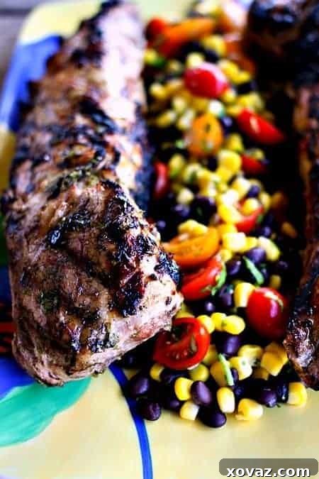 Close-up of perfectly grilled Tequila Lime Pork Tenderloin slices