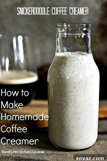 Close-up of homemade Snickerdoodle Coffee Creamer, showcasing its creamy texture and flecks of cinnamon, invitingly poured into a glass jar. foodiewithfamily.com