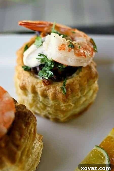 Carnival Shrimp and Black Bean Pastry Puffs 3 Close-up of Carnival Black Bean and Shrimp Puff Pastry Cups, a perfect Brazilian-inspired appetizer for entertaining.