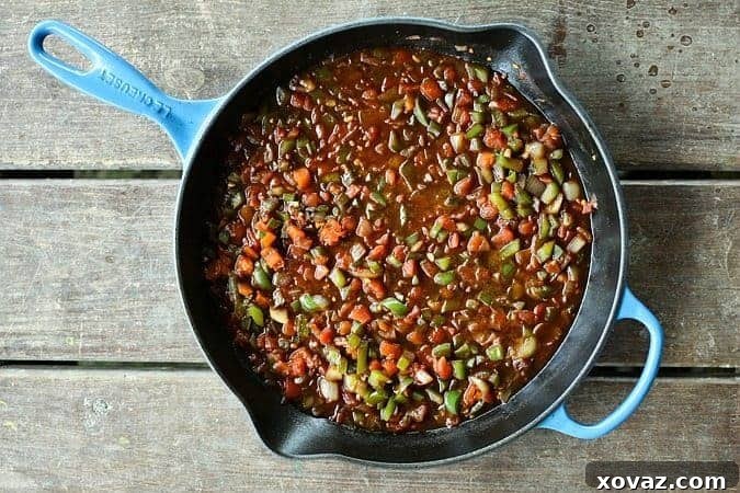 Fall-Apart Cuban Ropa Vieja: Instant Pot or Slow Cooker 3 Ropa Vieja: Thin shreds of flank steak braised in a rich tomato vegetable sauce with olives and capers. Prepare in an Instant Pot OR Slow-Cooker.