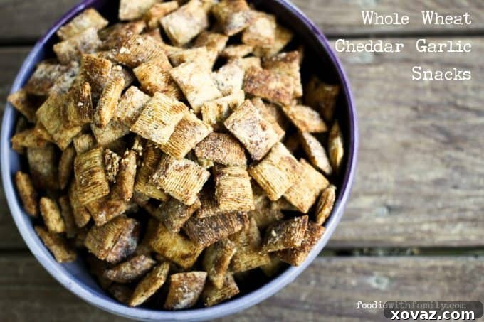 Whole Wheat Cheddar Garlic Snacks ready to be enjoyed, showcasing their golden crispness and cheesy coating