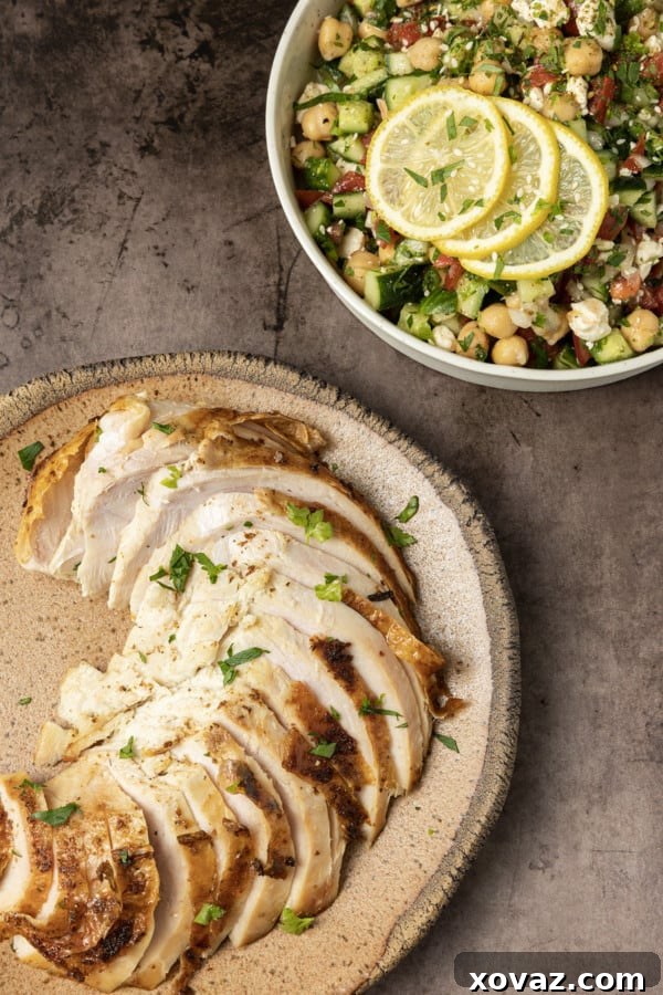 Smoked Turkey Perfection: Techniques for a Flavorful Feast 7 A freshly carved smoked turkey breast, showcasing its moist and tender meat.