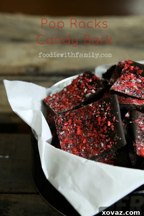 Exploding Chocolate Bark 3 Close-up of vibrant Pop Rocks Candy Bark, showcasing the delightful blend of chocolate and popping candy, perfect for holiday gifting