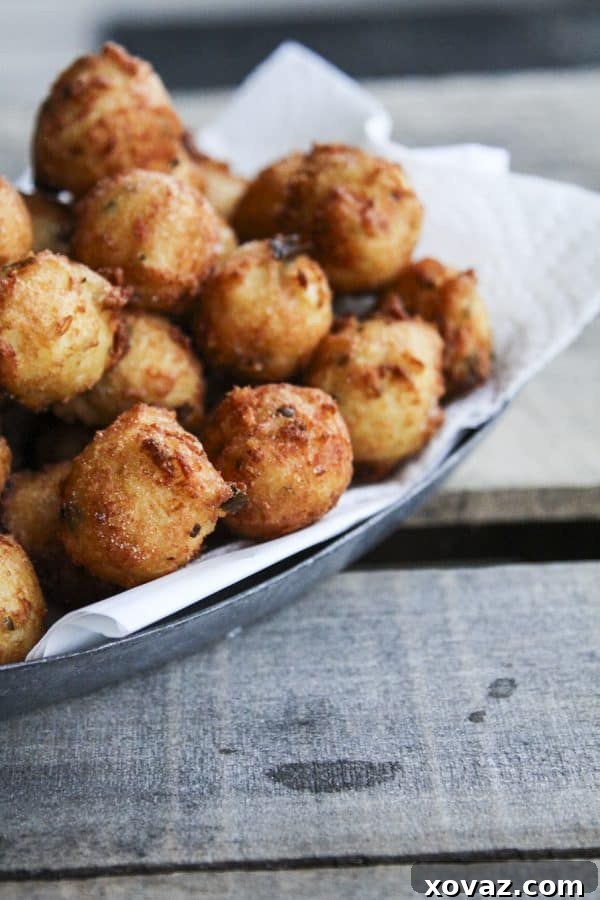 Golden Jalapeno Cheese Poppers 2 Irresistible Cheesy Jalapeno Potato Poppers, golden brown and perfectly fried, made with real potatoes