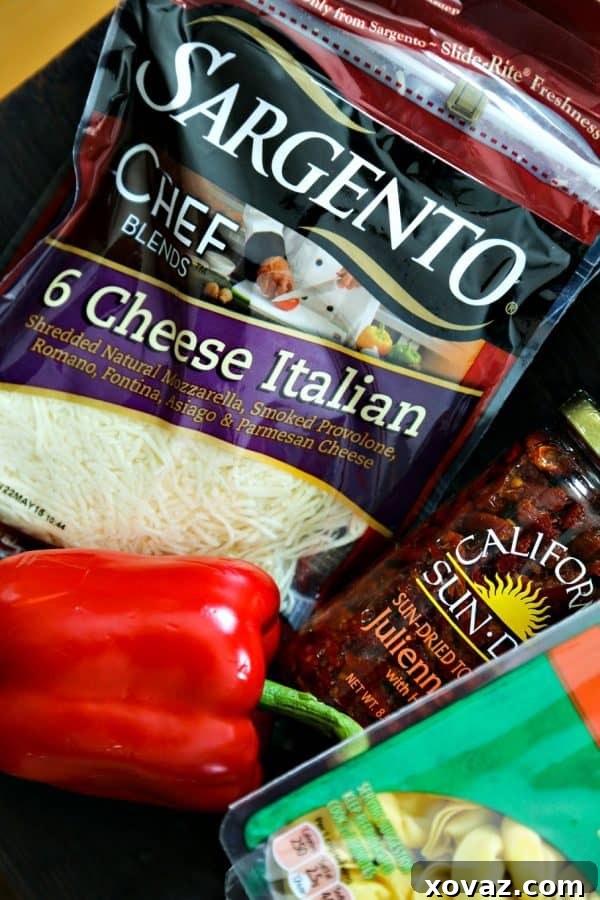 sundried tomatoes cheese tortellini roasted red pepper italian cheese blend chicken