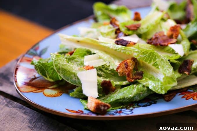 Close-up of Jerk Bacon in a Caesar Salad from foodiewithfamily.com