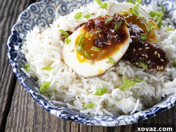 Freshly peeled and prepared Soy Sauce Eggs soaking in a jar of rich marinade.