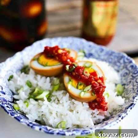 Soy Sauce Eggs soaked in soy sauce, garlic, ginger, rice vinegar, green onions, and fresh hot pepper.