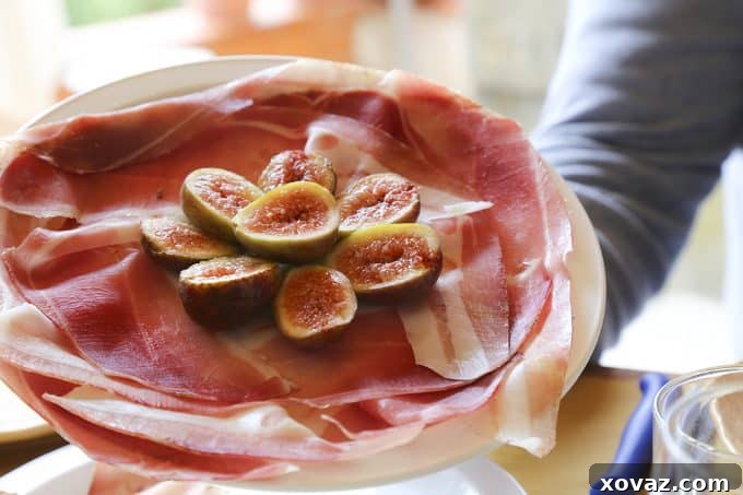 Exquisite prosciutto and fresh figs, served during a memorable lunch at Macelleria Falaschi's butcher shop in San Miniato.