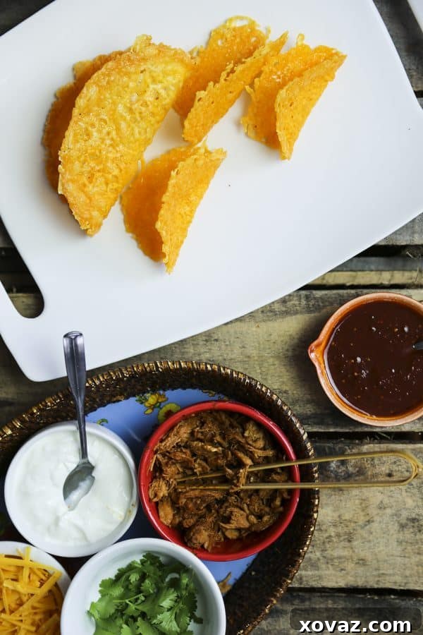 Crispy homemade Pure Cheese Taco Shells ready to be filled for a delicious taco night