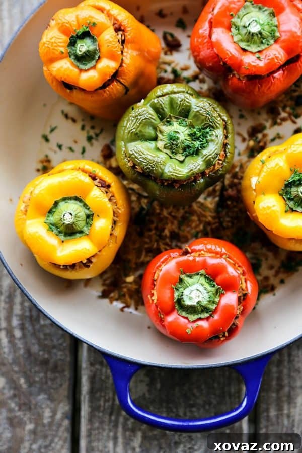 Healthy Greek Stuffed Peppers 2 Delicious and healthy Lightened Up Greek Style Stuffed Peppers, a perfect Mediterranean-inspired meal.