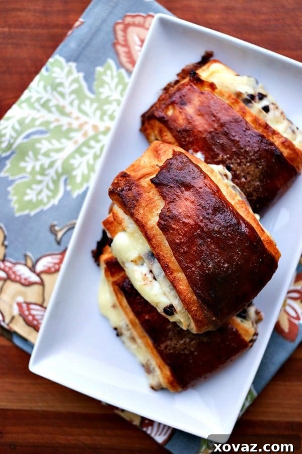 Exquisite French Chocolate Custard Pastries 2 Plié Au Chocolat: buttery puff pastry spread on one side with pastry cream & miniature chocolate chips, then folded, & baked to flaky, mahogany perfection.