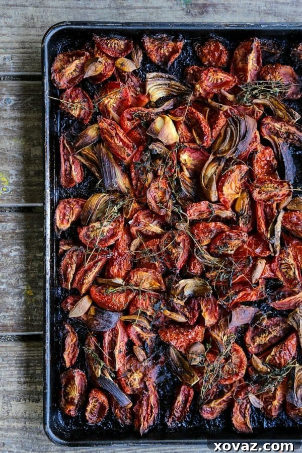 Roasted tomatoes, onions, garlic, and herbs transforming into 'Best Thing Tomatoes,' a concentrated puree.