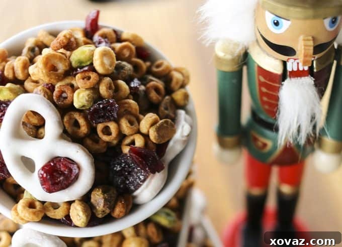 Festive Cranberry Pistachio Delight 2 This Cranberry Pistachio Snack Mix is designed to boost your energy without slowing you down. It's a perfect healthy holiday snack for the whole family, especially during busy Nutcracker season. #sponsored