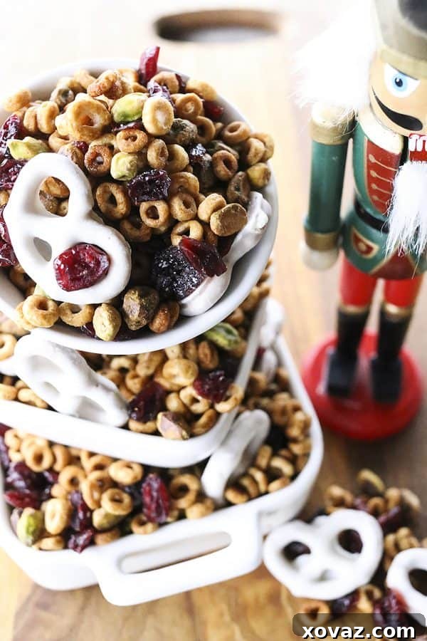 Festive Cranberry Pistachio Delight 4 This Cranberry Pistachio Snack Mix is designed to boost your energy without slowing you down. It's a perfect healthy holiday snack for the whole family, especially during busy Nutcracker season. #sponsored