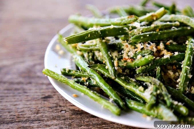 Savory Garlic Parmesan Green Beans 3 Another angle of Garlic Parmesan Green Beans, highlighting their golden-brown breadcrumb topping and vibrant color.