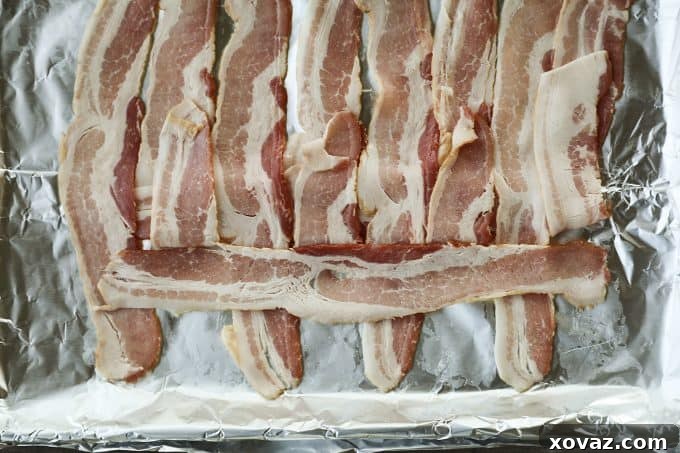 Further steps in weaving bacon for Low-Carb Bacon Bun Swiss Burgers: Slices 1, 3, 5, and 7 are folded back down, then slices 2, 4, 6, and 8 are folded up, preparing for the next cross-wise strip.