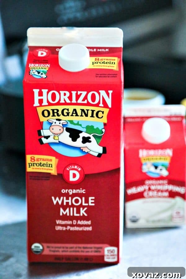 A close-up of Classic Sausage Gravy poured over a stack of golden-brown biscuits, emphasizing the rich texture and comforting appeal.