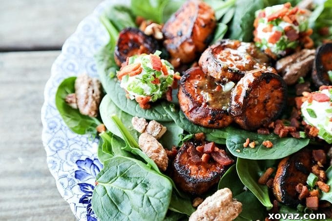 Velvety Sweet Potato Dream with Maple Pecan Crunch and Savory Bacon 2 Melting Sweet Potato Salad: tender baby spinach salad with gorgeous, caramelized, deep orange melting sweet potato rounds, crumbled bacon, goat cheese crusted with more bacon and fresh chives, candied maple pecans, and an irresistible hot bacon vinaigrette dressing.