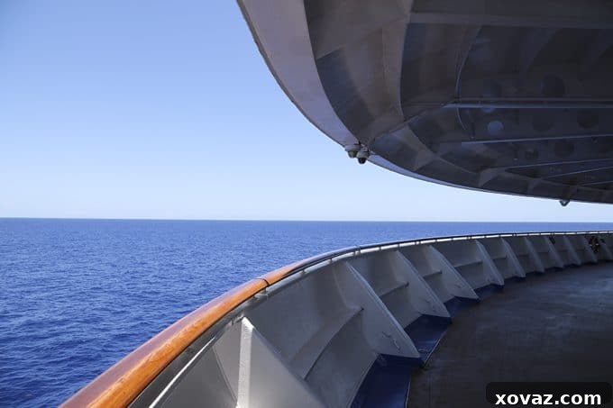 On the forward deck of the Caribbean Princess with Princess Cruises.