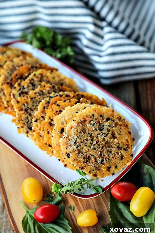 Golden brown Everything Parmesan Crisps arranged on a serving board, ready to be enjoyed.