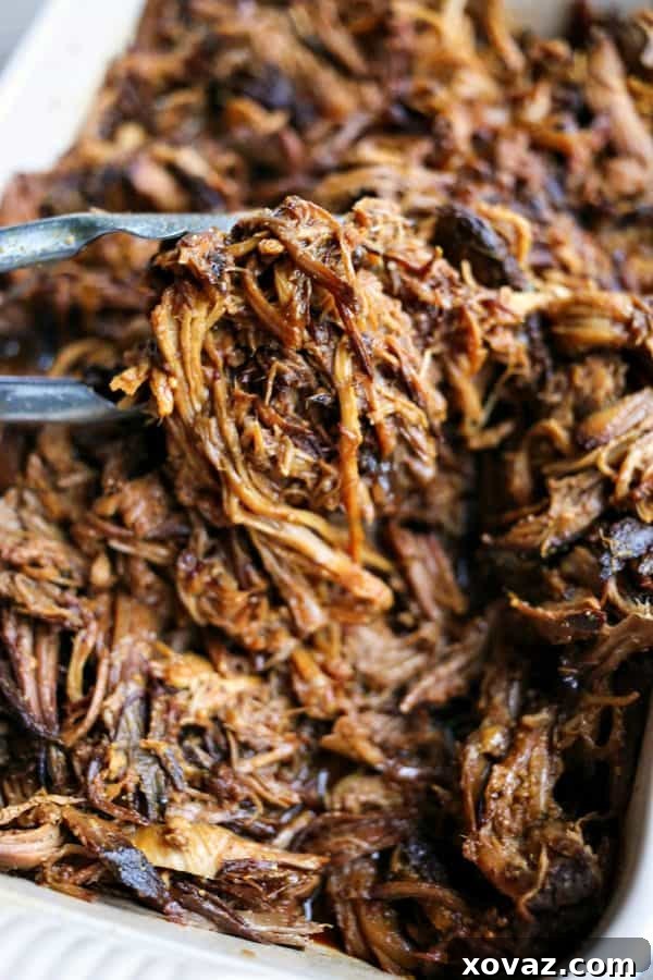 Slow-Cooker Apple Cider Pulled Pork is succulent, tender, delicious, and oh-so-easy.