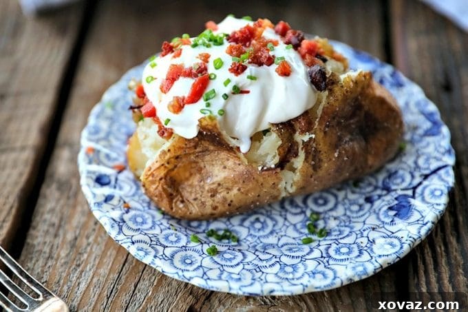 Mastering the Perfect Baked Potato 5 Close-up of the crispy skin of a perfectly baked Russet potato.