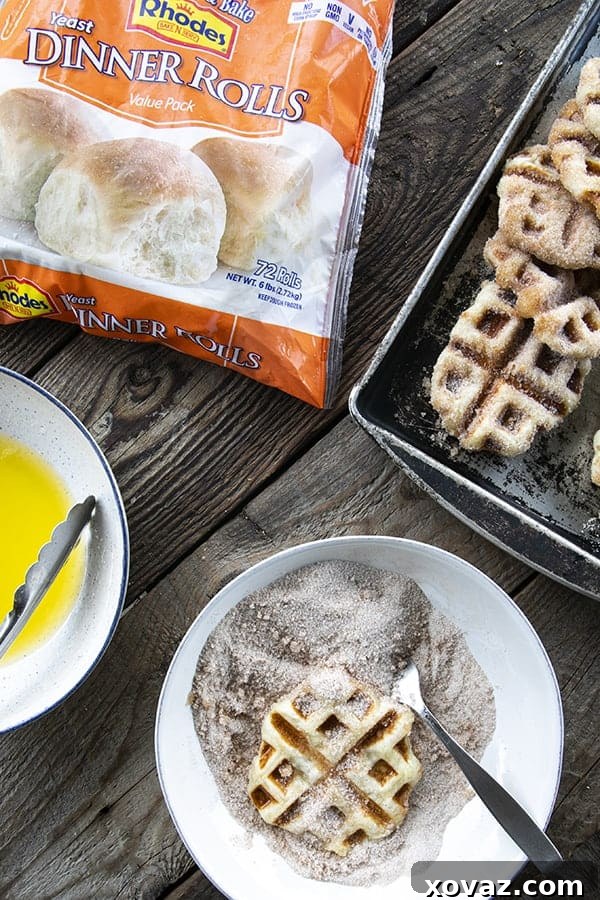 Crispy edged, cinnamon-sugar dusted Churros Waffles are 100% irresistible and ridiculously easy to make, taking advantage of frozen dough for the base. Bonus: No boiling oil!