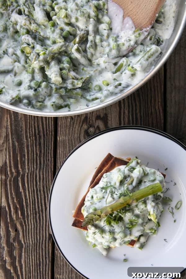 Lush Creamed Asparagus and Peas 2 Tender spring peas and asparagus combine in a garden herb cream sauce in this new-fashioned take on delightfully old-fashioned Creamed Peas. Served over toast, this is one simple, economical dish wows!