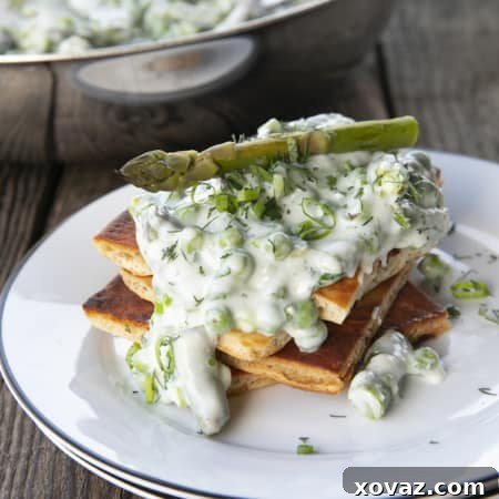 Lush Creamed Asparagus and Peas 7 Tender spring peas and asparagus combine in a garden herb cream sauce in this new-fashioned take on delightfully old-fashioned Creamed Peas. Served over toast, this is one simple, economical dish wows!