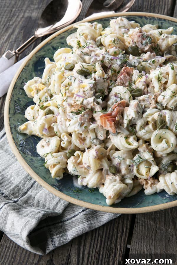 Zesty Salmon Pasta Salad 2 Delicious Smoked Salmon Pasta Salad with creamy dill dressing, hard-boiled eggs, capers, and red onions.