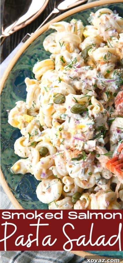 Zesty Salmon Pasta Salad 11 Smoked Salmon Pasta Salad garnished with fresh dill in a white bowl.