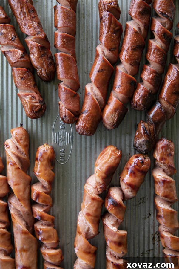 A Spiral Hot Dog maximizes the grilled crispy bits making them the ultimate char-grilled hot dogs for holding onto all the mustard, ketchup, relish, and onions that a good hot dog deserves!