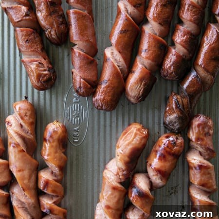 A Spiral Hot Dog maximizes the grilled crispy bits making them the ultimate char-grilled hot dogs for holding onto all the mustard, ketchup, relish, and onions that a good hot dog deserves!