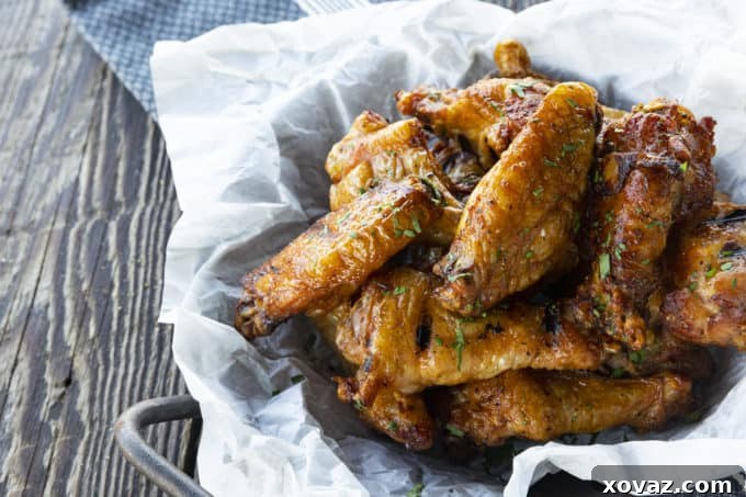 Smoky Crispy Chicken Wings 6 A serving of crispy smoked chicken wings, perfectly seasoned and ready to be enjoyed.